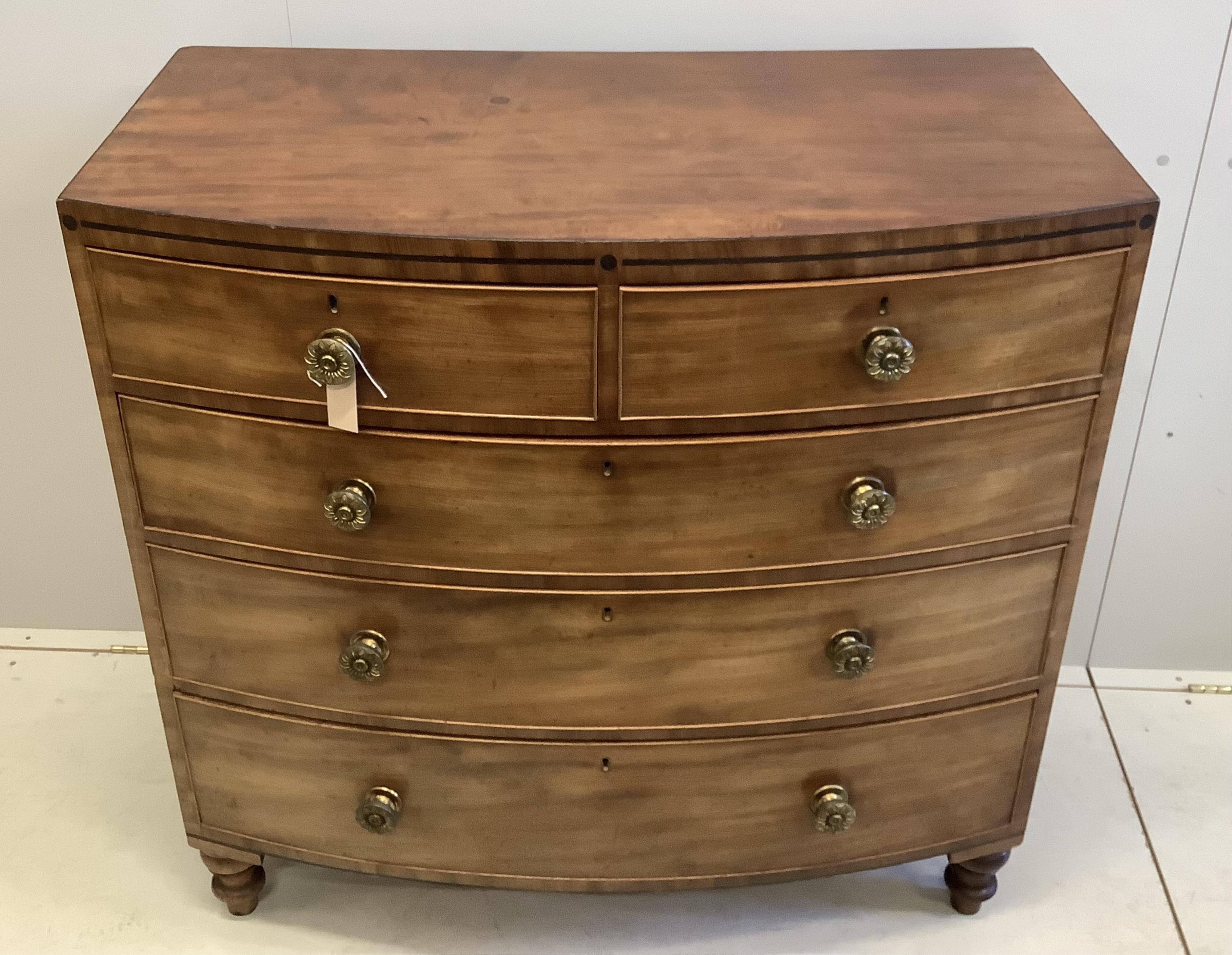 A Regency ebony strung mahogany bowfront chest, width 107cm, depth 56cm, height 106cm